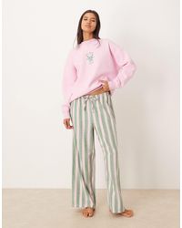 ASOS - – pyjama-set mit logo-sweatshirt aus jersey und gewebter, gestreifter hose - Lyst