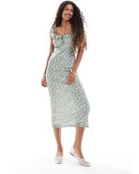 New Look - Robe mi-longue en tulle à petites fleurs et manches à volants - Lyst