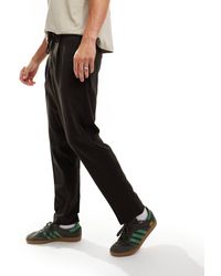 SELECTED - – locker geschnittene, schmal zulaufende hose - Lyst