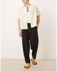 ASOS - – elegante, schmal zulaufende oversize-hose aus leinenmix - Lyst