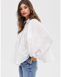 ASOS Chemise babydoll en coton à manches longues avec broderie - Blanc