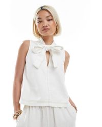 ASOS - Denim Top Met A-Lijn En Strik Aan De Hals - Lyst