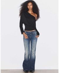 Stradivarius - Embroidered Pocket Bell Bottom Jeans - Lyst