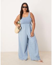 ASOS - Asos Design Curve Soft Denim Wide Leg Jumpsuit With Shirred Body - Lyst