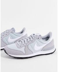 women's nike black & white internationalist trainers