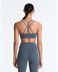 Oysho - Comfortlux Light Support Sports Bra With Crossover Straps - Lyst