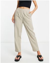 Pantaloni della tuta elasticizzati beige di Mango in Neutro eleganti e chino da Pantaloni skinny Donna Abbigliamento da Pantaloni casual 