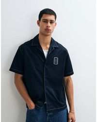 Lacoste - Short Sleeve Button Through Logo Polo Shirt - Lyst
