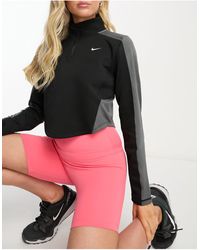 Nike - Nike - pro femme training dri-fit - top a maniche lunghe nero con zip corta - Lyst