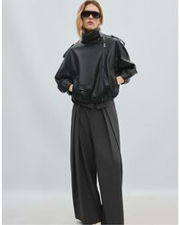 Stradivarius - Veste biker à effet cuir et manches ballon e - Lyst