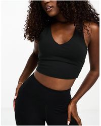 ASOS 4505 - Débardeur doux décolleté plongeant avec soutien-gorge intégré - Lyst