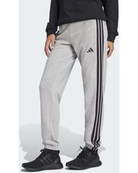 adidas - Essentials 3-Stripes Cuffed Joggers + Mujer Pantalones - Lyst