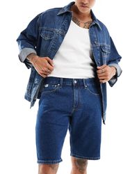 Calvin Klein - Short en jean coupe classique - bleu foncé délavé - Lyst