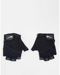 Nike - Guantes deportivos negros para mujer elemental - Lyst