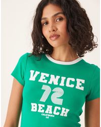 Gina Tricot - Slim-Fit T-Shirt Met Korte Mouwen En Venice Beach-Print - Lyst