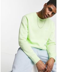 nike club crew neck sweat in mustard