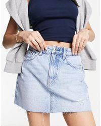 Stradivarius - Denim Mini Skirt With Raw Hem - Lyst