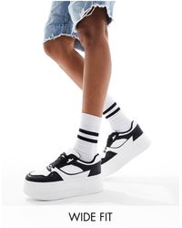 London Rebel - Sneakers flatform a pannelli bianche e nere a pianta larga - Lyst