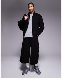 ASOS - Pantalones Cortos Negros Extragrandes De Corte Alargado De (Parte De Un Conjunto) - Lyst