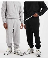 ASOS - Pack De 2 Joggers De Color Negro Y Gris Jaspeado Básicos Extragrandes De - Lyst