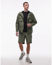 Rains - 12210 Pocket Waterproof Cargo Hooded Jacket - Lyst