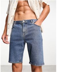 ASOS - Pantaloncini di jeans skinny lunghezza normale lavaggio medio piatto - Lyst