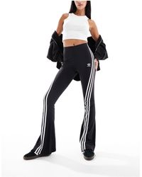 adidas Originals - Three Stripe Flared leggings - Lyst