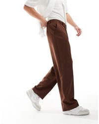 ASOS - Pantaloni eleganti a fondo ampio marroni - Lyst