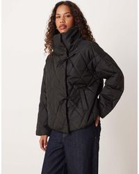 Vila - High Neck Quilted Jacket With Tie Details - Lyst