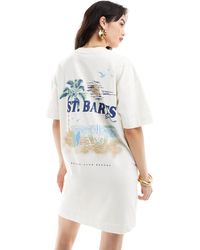 ASOS - Robe t-shirt courte et oversize à imprimé st. barts - crème - Lyst