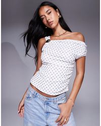 River Island - Asymmetric Sleeve Polka Dot Mesh Top - Lyst
