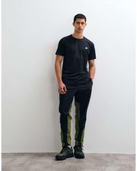 New Balance - Utility Stretch Woven Pant - Lyst