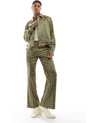 ASOS - Pantalon évasé d'ensemble habillé à imprimé géométrique - multicolore - Lyst