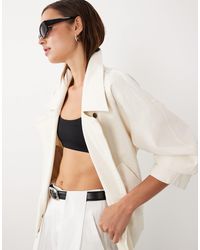 Mango - Starring Hailey Bieber Cropped Trench Coat - Lyst