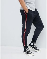 Pantalones, pantalones de vestir y chinos Pull\u0026Bear de hombre desde 18 €