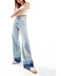 Lee Jeans - Stella - jeans ampi svasati lavaggio chiaro con orlo scucito - Lyst