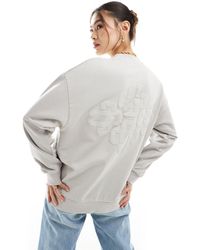 The Couture Club - Washed Emblem Sweatshirt - Lyst