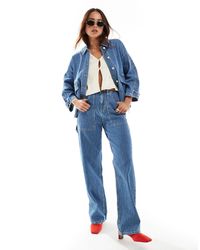 ONLY - Kirsi - jeans cargo con fondo ampio a vita alta a righe bianche - Lyst