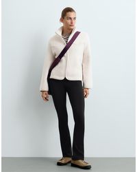 Oysho - High Rise Warm Flare Trousers With Zips - Lyst