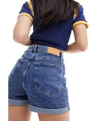 Noisy May - Pantalones Cortos Vaqueros Azules De Talle Alto Con Lavado Medio Y Bajos Vueltos Moni De - Lyst