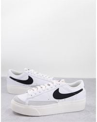 Nike - Blazer - sneakers basse con plateau bianche e nere - Lyst