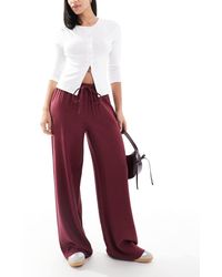 ASOS - Pantalon ample habillé à enfiler en tissu doux - bordeaux - Lyst