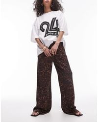 TOPSHOP - – gerade geschnittene satinhose mit dunklem leopardenmuster und tunnelzug - Lyst