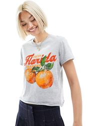 ASOS - T-shirt effet rétréci à imprimé oranges - chiné - Lyst