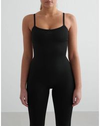 Aim'n - Shape Seamless Bodysuit - Lyst