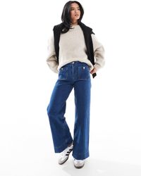 Stradivarius - Petite D77 Staight Leg Jean With Button Detail - Lyst