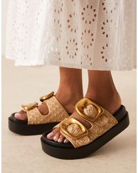 Asos Design Wide Fit - Femi - mules à boucles oversize et semelle moulée - naturel - Lyst
