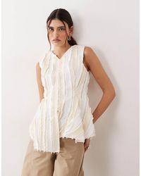 ARRANGE - Sleeveless Raw Edge Pleated Top - Lyst