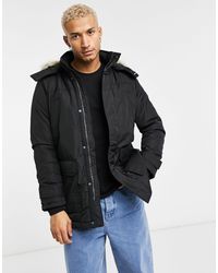 Tommy Hilfiger Down and padded jackets for Men - Up to 70% off | Lyst