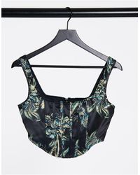 Missguided Top corto negro con estampado floral estilo corsé